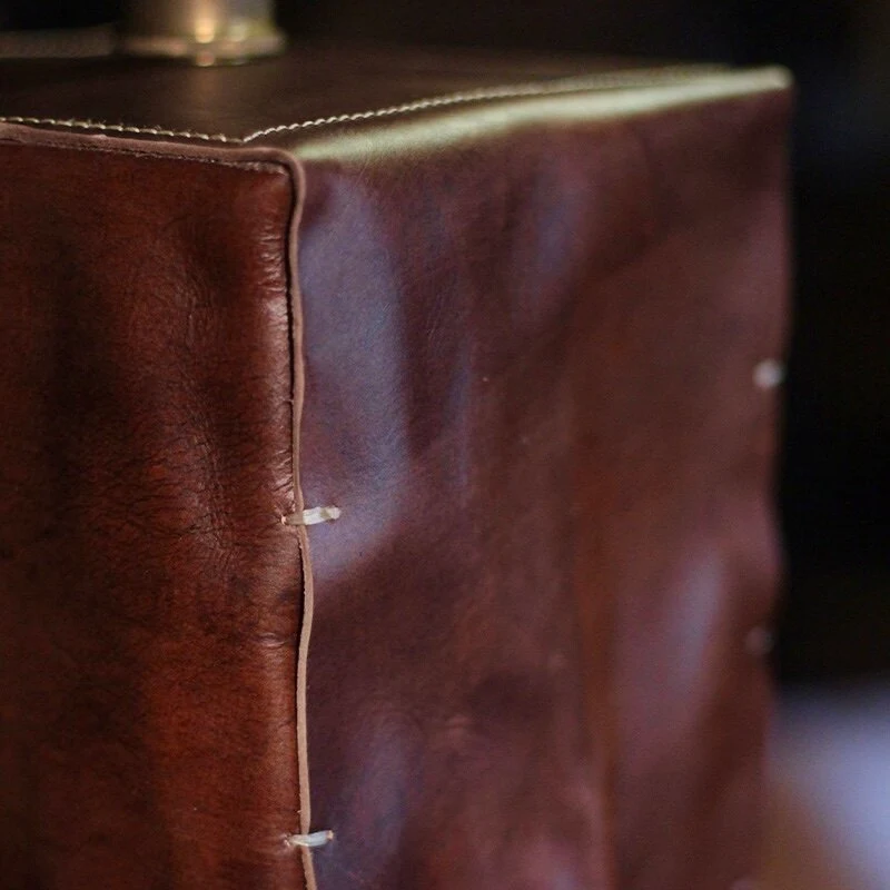 Brown leather stitched edge detail