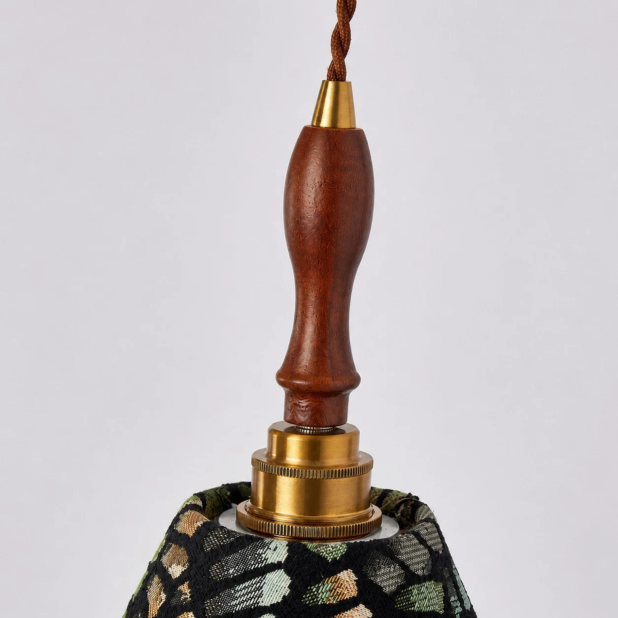 Fabric shade and wood hardware detail
