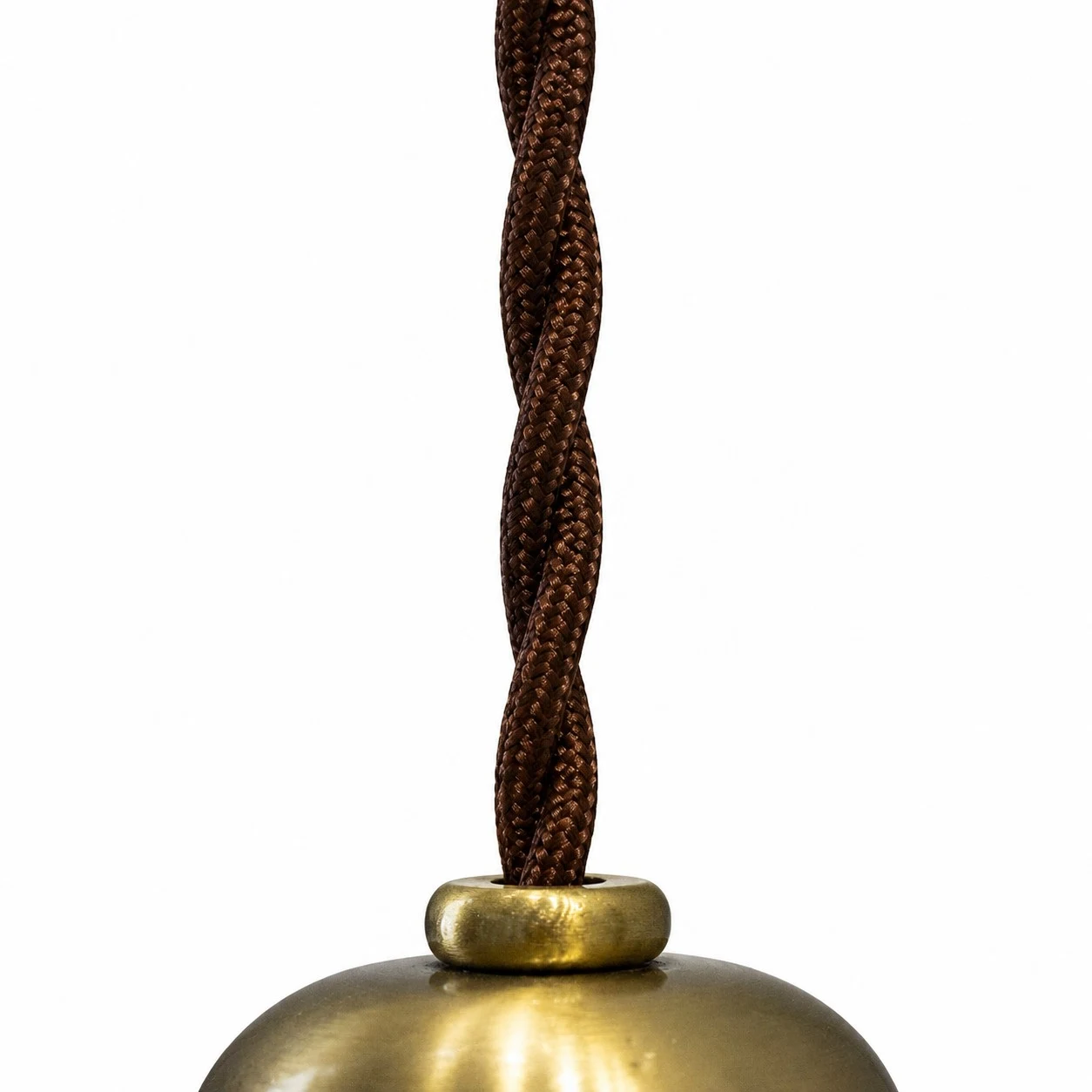 Braided cord and brass pendant lamp hardware detail