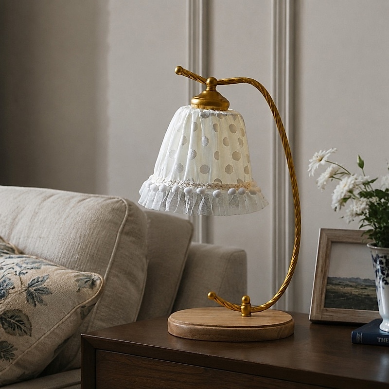 Lace shade table lamp on a side table in a soft neutral room