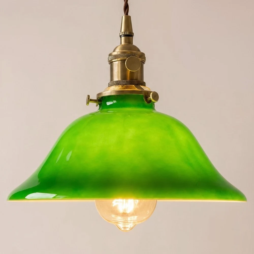 Glowing green glass pendant lamp underside detail