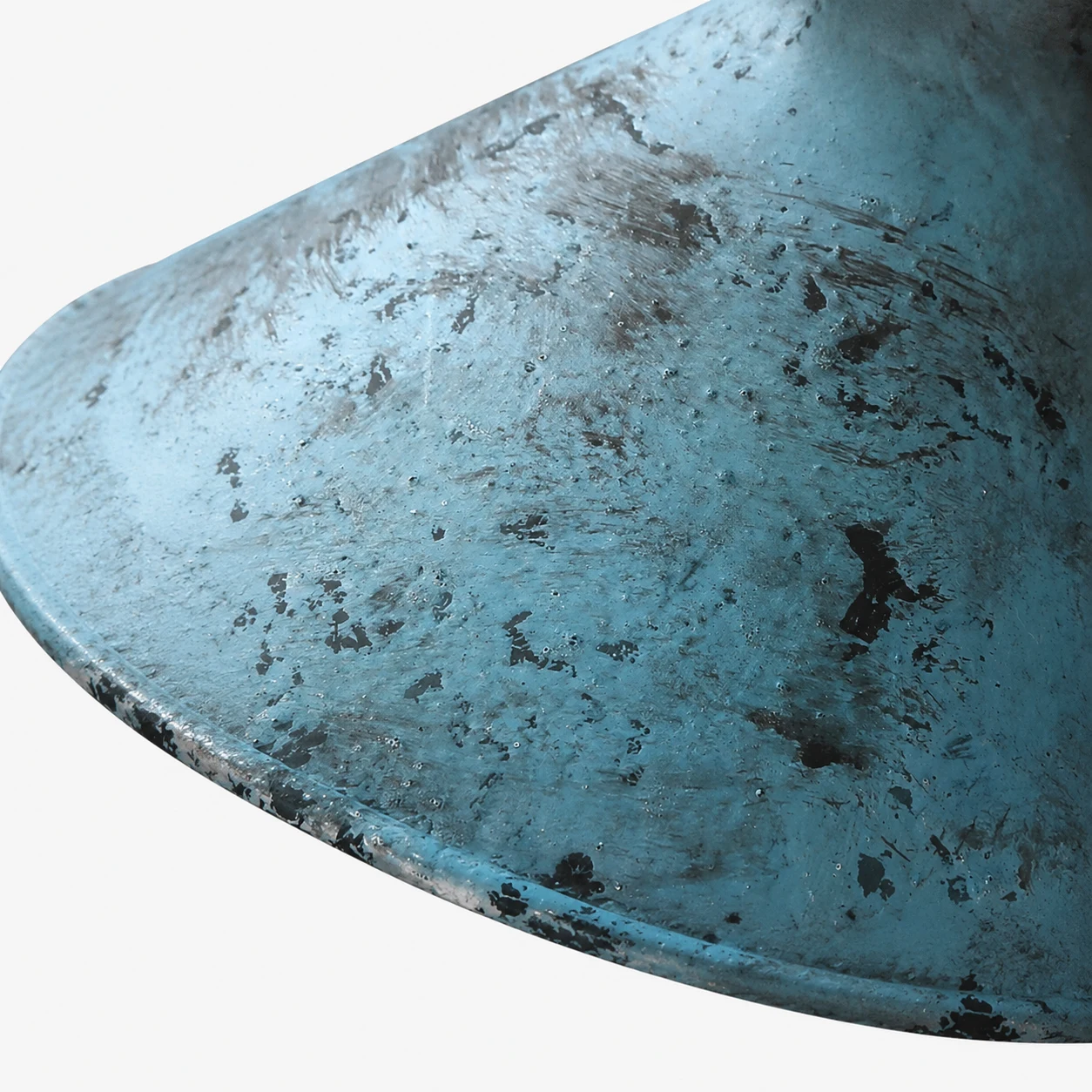 Close view of distressed blue metal shade texture