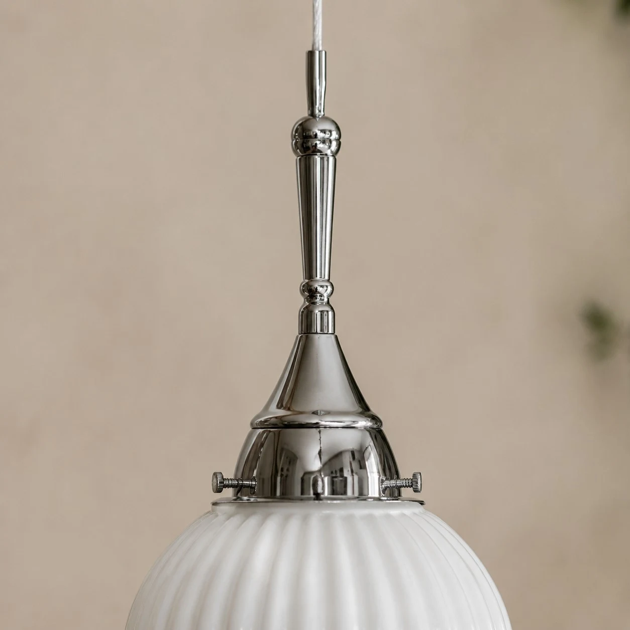 Close view of polished metal cap and stem