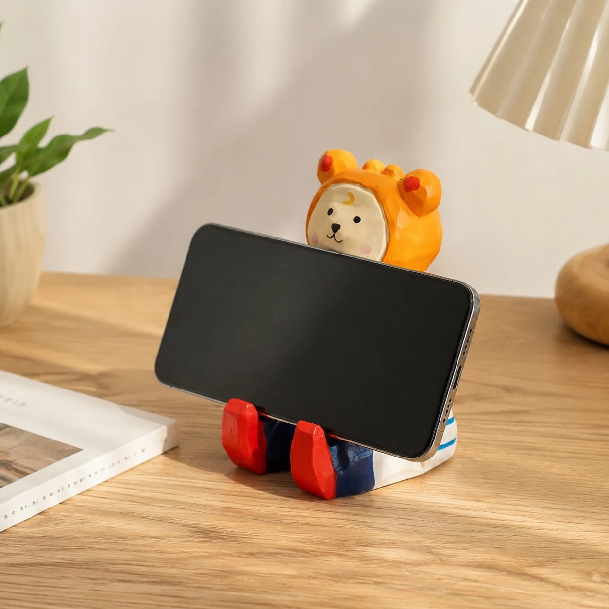 Wooden animal phone stand scene view