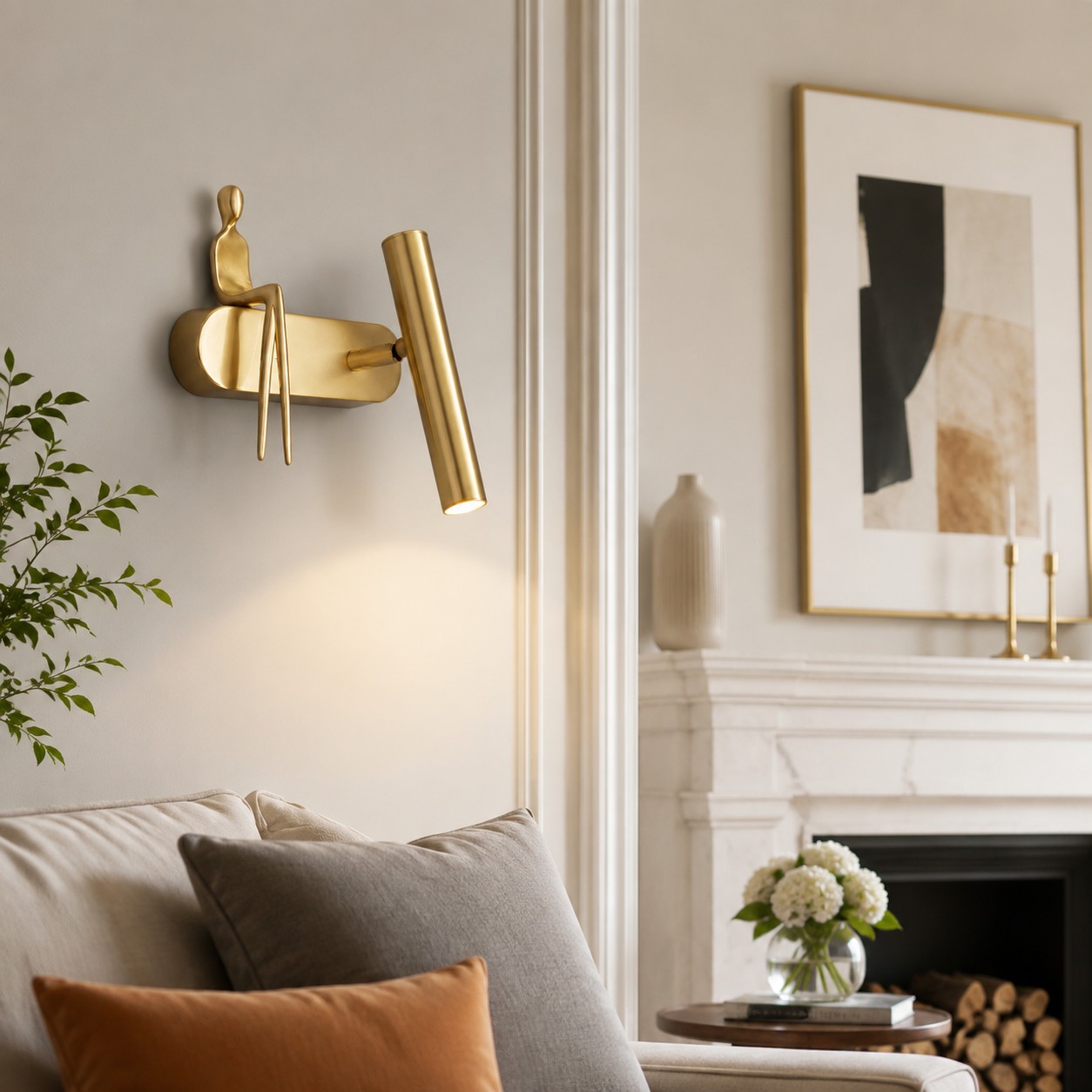 Wall sconce installed near framed art and seating