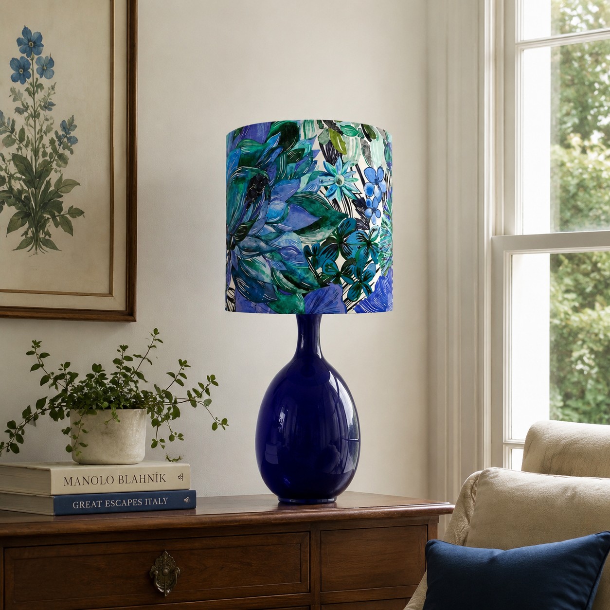 Green botanical fabric ceramic table lamp styled by a sofa